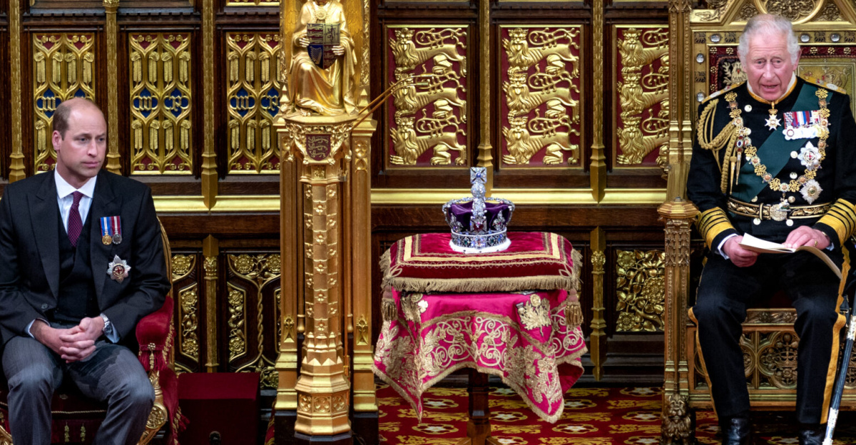 The Prince of Wales delivers the speech with the Duke of Cambridge sitting to the left and Duchess of Cornwall to the right. It is written by the government and sets out its legislative agenda for the 2022-23 session.
<p>Find out more about State Opening www.parliament.uk/business/news/2022/may-2022/state-openi...
</p><p>This image may be used with acknowledgment: Copyright House of Lords 2022 / Photography by Annabel Moeller.
</p>
<div class="mw-heading mw-heading2"><h2 id="Heraldry_on_screen">Heraldry on screen</h2></div>
<p>The present House of Lords was built between 1840-7.
</p>
<ul><li>Centre: Royal arms of Queen Victoria, circumscribed by the Garter with royal motto below <i>Honi Soit Qui Mal Y Pense</i>;</li>
<li>Dexter (viewer's left): Arms of the Prince of Wales (the future King Edward VII). Royal arms differenced by <i>a label of three points argent</i>; Circumscribed by the Garter. Below: motto of the Prince of Wales <i>Ich Dien</i>. Two smaller shields on either side: dexter: Arms of Duchy of Cornwall, with crest of a crown; with motto of the Prince of Wales below; sinister: Arms of Earldom of Chester (<i>Azure, three garbs or</i>) arms adopted by <a href="https://en.wikipedia.org/wiki/Ranulf_de_Blondeville,_6th_Earl_of_Chester" class="extiw" title="w:Ranulf de Blondeville, 6th Earl of Chester">Ranulf de Blondeville, 6th Earl of Chester</a> (died 1232); with crest <i>A lion statant guardant or</i>, with motto of the Prince of Wales below. Below all: the repeated initials "WP" (<i>Waliensis Princeps</i>, "Prince of Wales").</li>
<li>Sinister (viewer's right): Arms of Albert, Prince Consort: Quarterly of 4: 1&4: <i>Royal arms of Queen Victoria differenced by a label of three points argent the centre point charged with a cross gules</i>; 2&3: Arms of the Duchy of Saxe-Coburg and Gotha (Saxony): <i>Barry of ten sable and or, over all a crown of rue (rautenkranz/crancelin) in bend vert</i>. Circumscribed by the Garter. With his motto below: <i>Treu Und Fest</i> ("Loyal and Sure"). Two shields on either side: Dexter, as quarters 1&4; sinister: as quarters 2&3, with his motto repeated below each. Below the repeated initials "AP" (<i>Albertus Princeps</i>).</li>
<li>Behind the throne: Ten rectangular panels showing the arms of Plantagenet - the lions are shown crowned which is unusual.</li></ul>