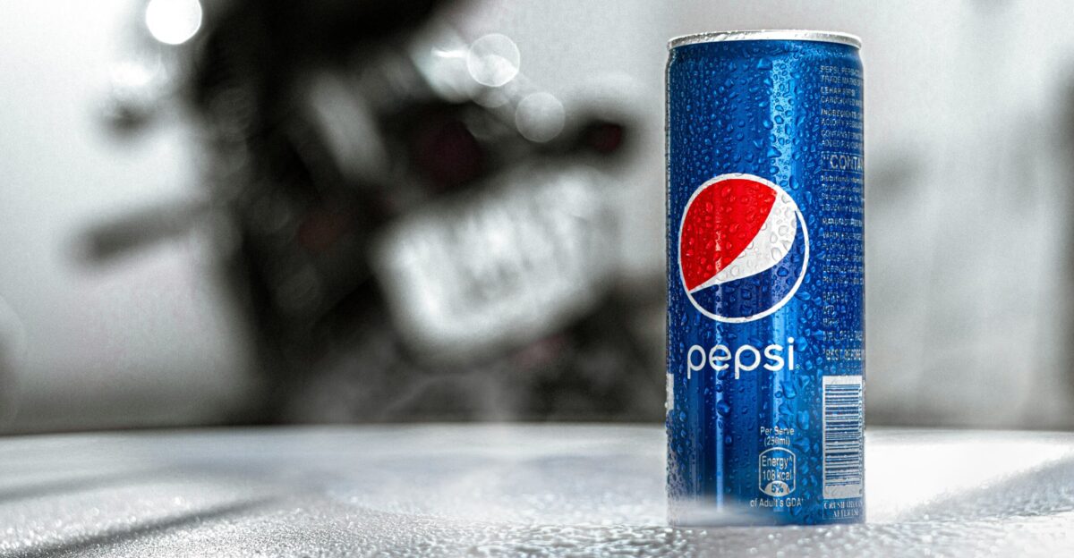 pepsi can on gray table