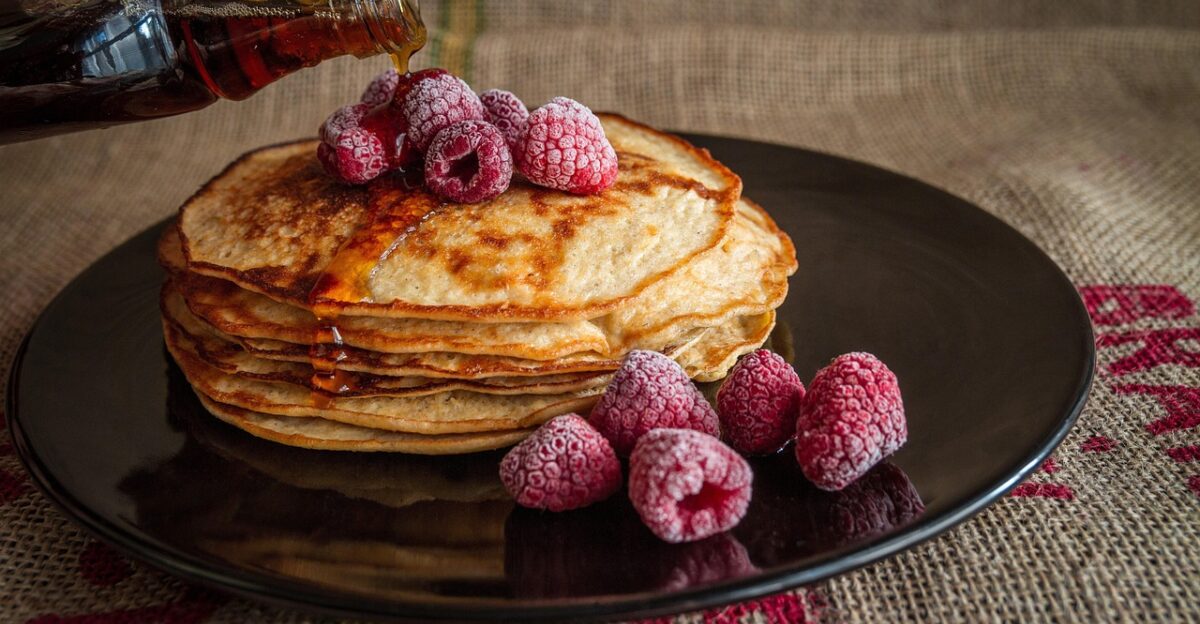 pancakes maple syrup raspberries breakfast pouring syrup plate breakfast plate stack stack of pancakes breakfast food breakfast meal sweet food delicious morning tasty fruits food photography pancakes breakfast breakfast food food food food food