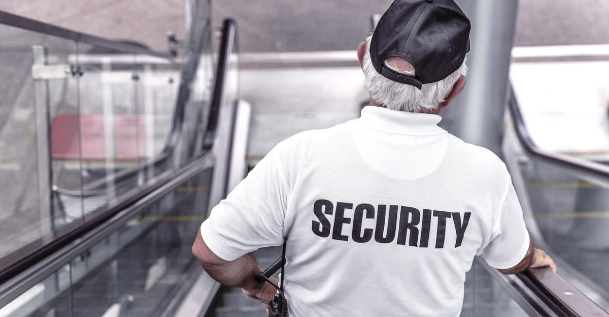 security, man, escalator, police, guard, officer, surveillance, control, monitoring, safety, uniform, back view, security, security, security, security, security, police, safety