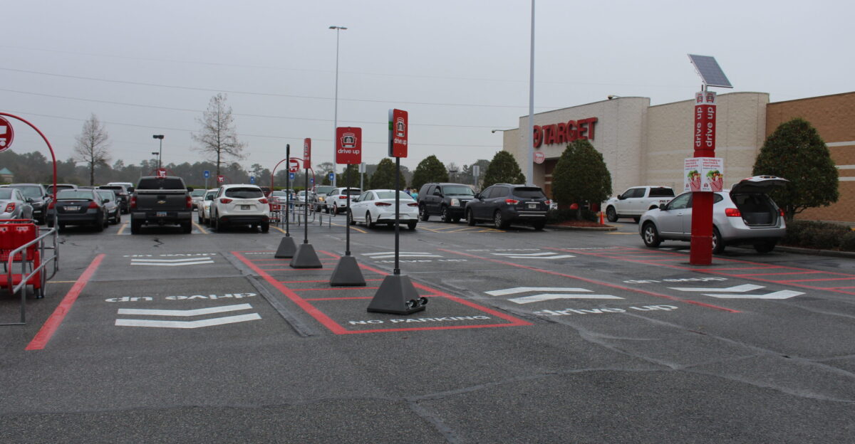 Target Dirve Up lanes with a grey SUV awaiting delivery from the store Valdosta Lowndes County Georgia