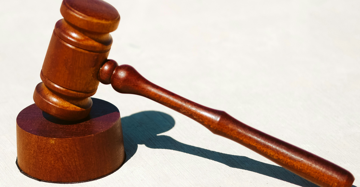 brown wooden tool on white surface