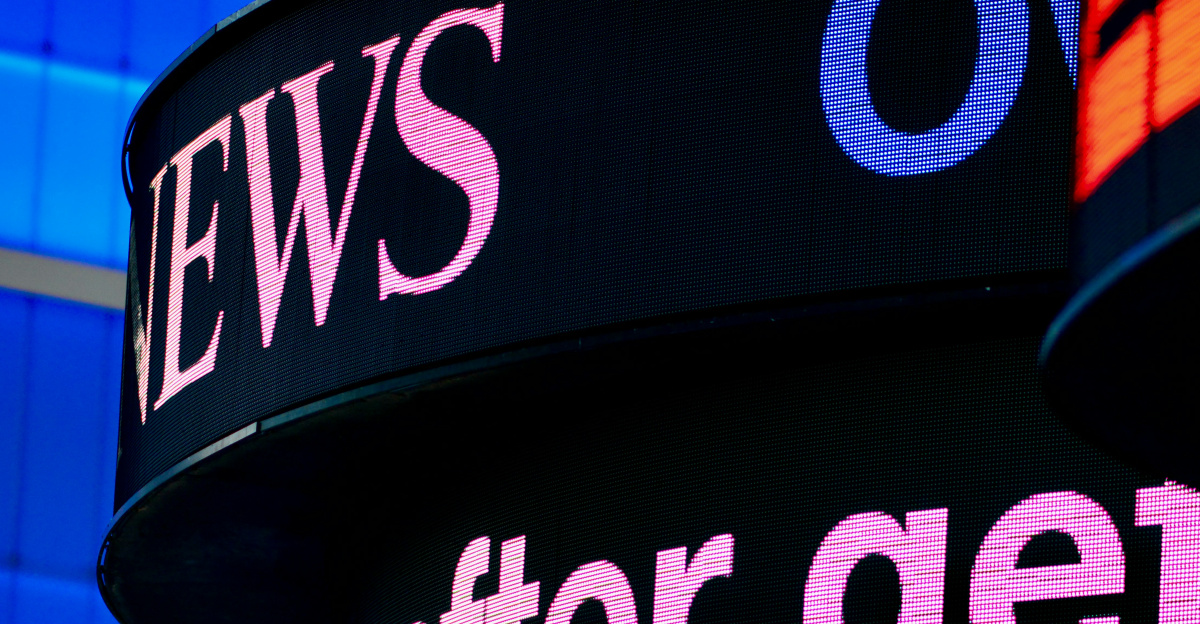 a close up of a sign with a building in the background