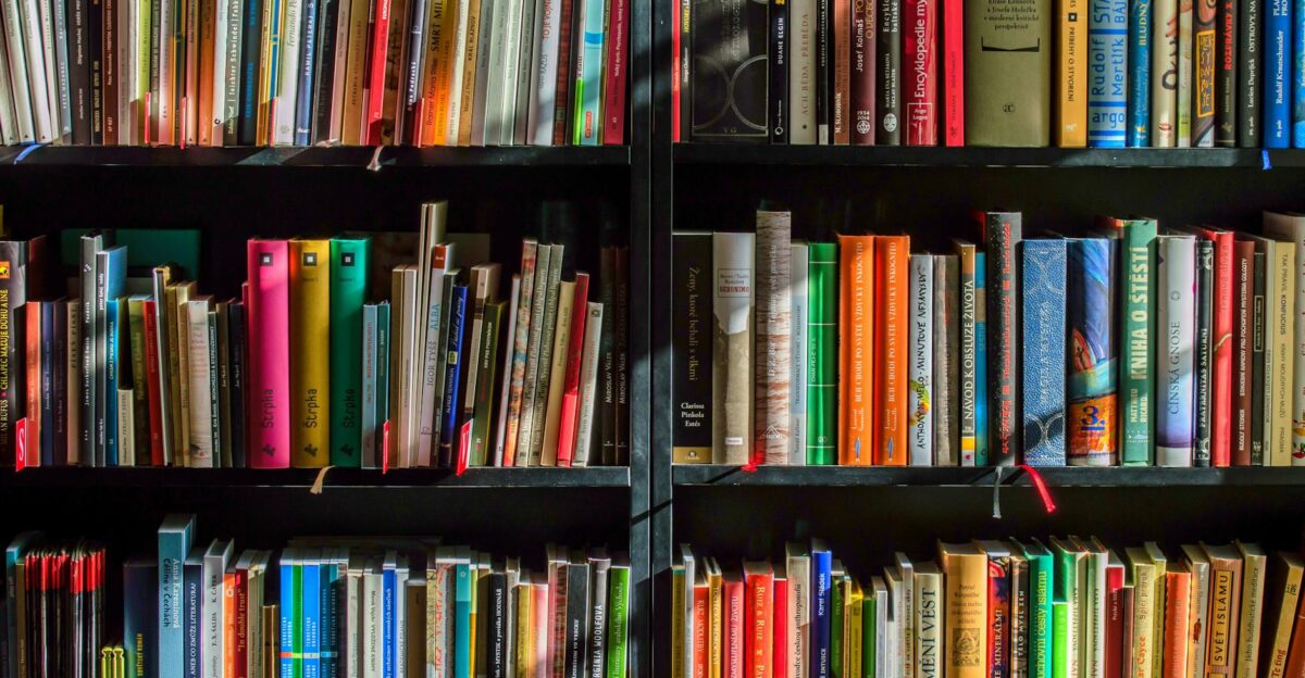 Vibrant collection of books on shelves for reading research and education