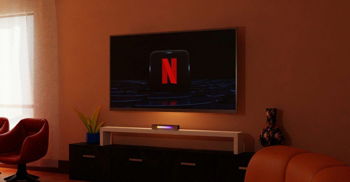 a living room with a flat screen tv on the wall