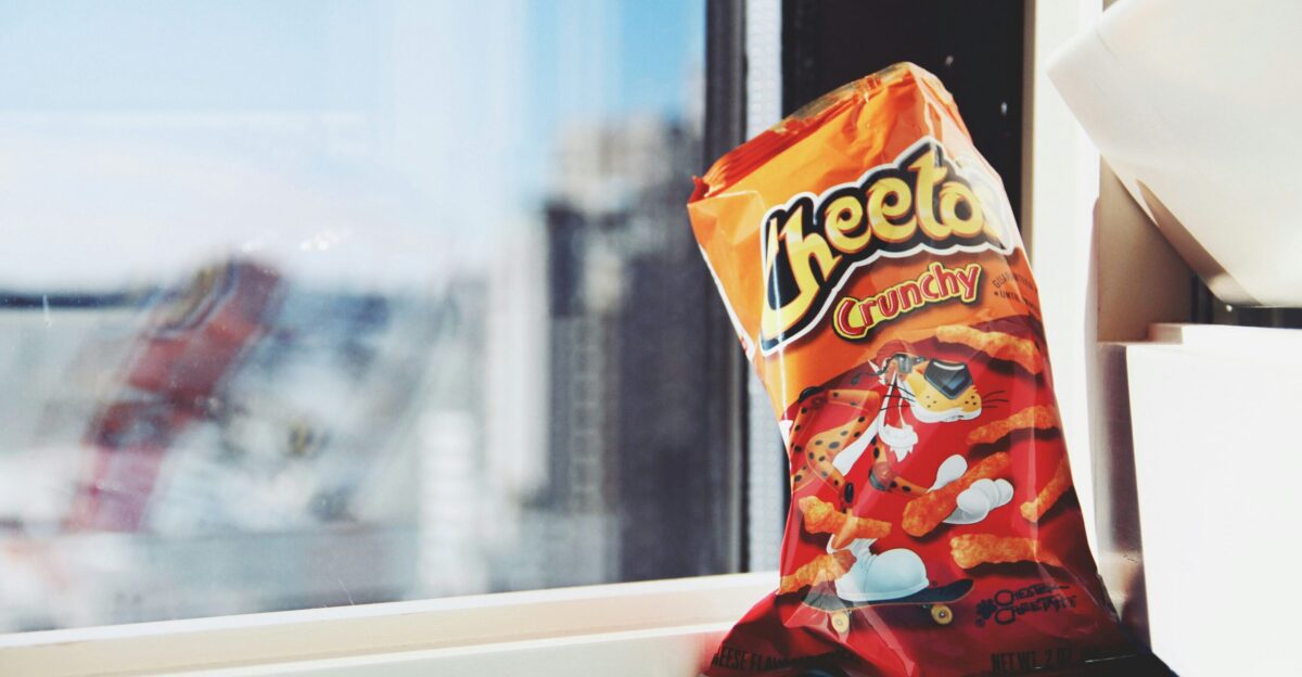 orange and yellow plastic pack on white table